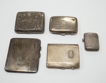 Three assorted silver cigarette cases including Art Deco, largest 10.1cm, a silver vesta case and a white metal cigarette case.